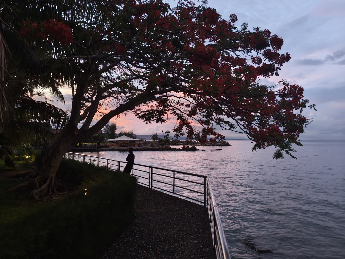 Sunset over Honiara shoreline and breakwater