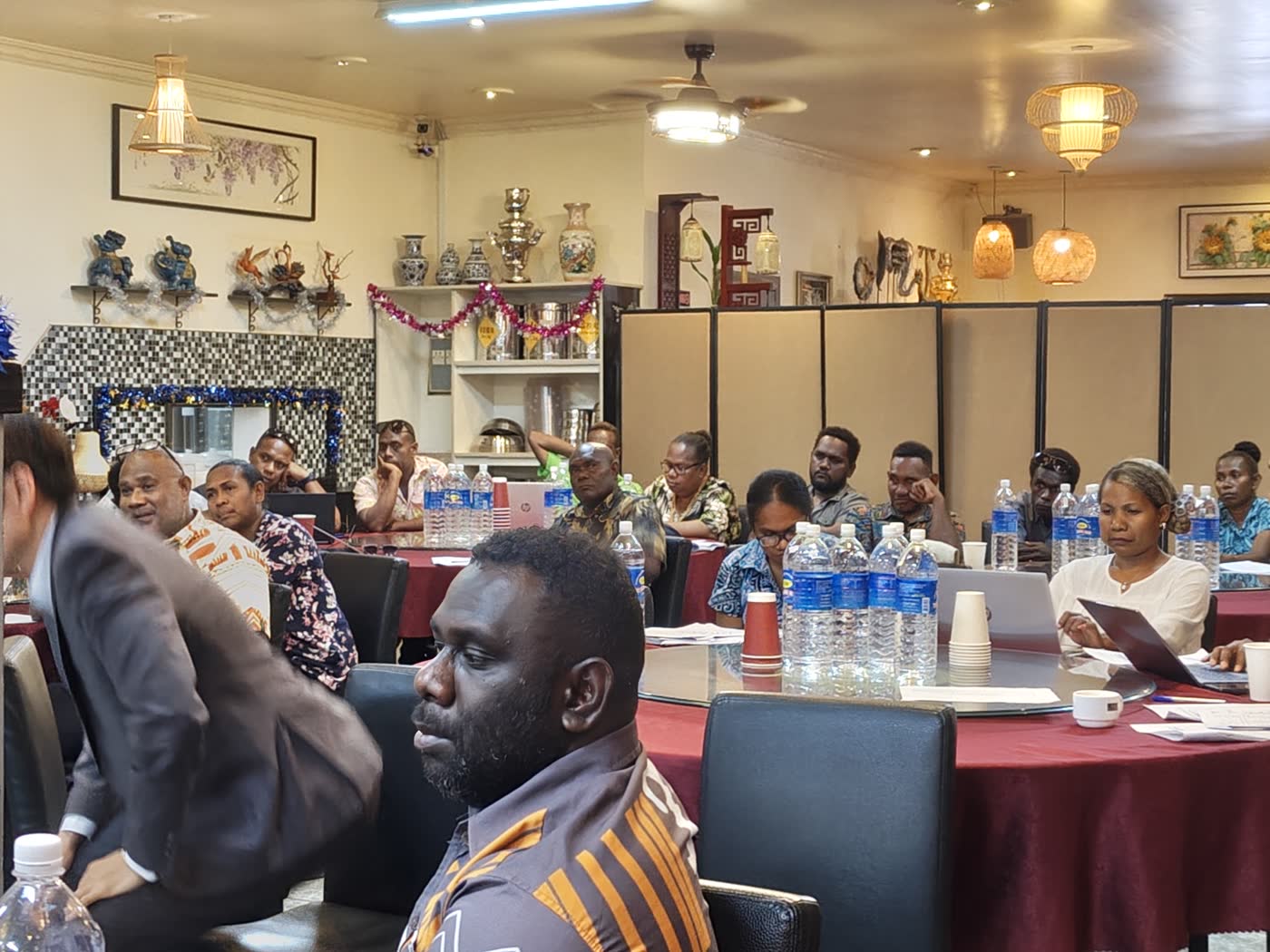 Workshop participants seated in roundtable format